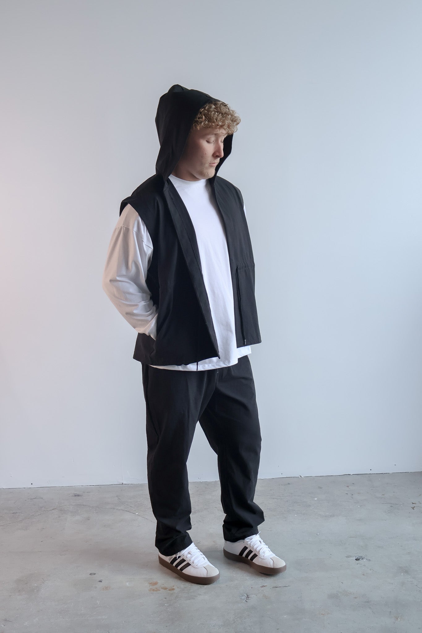 The Easy Layer Hooded Vest in Black